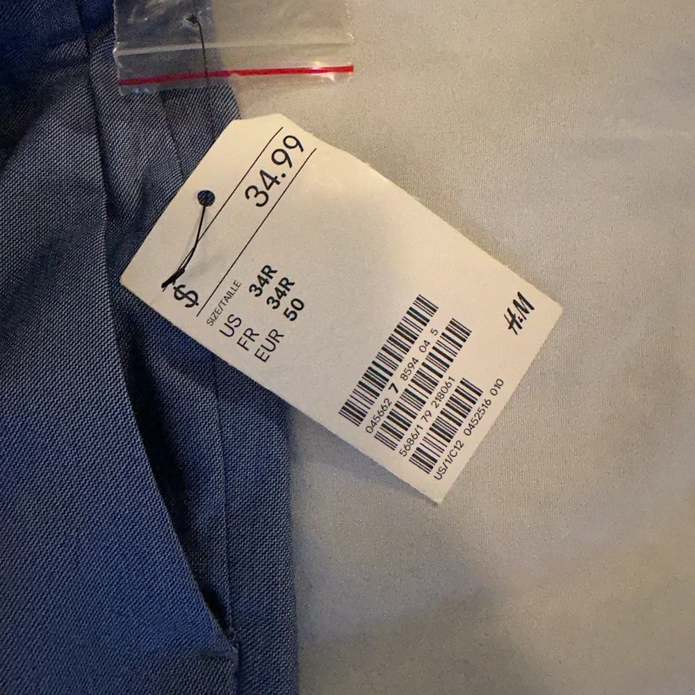 H&M dress pants, light blue, size 34R, new with tags